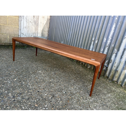 48 - A danish teak coffee table 150x60x45