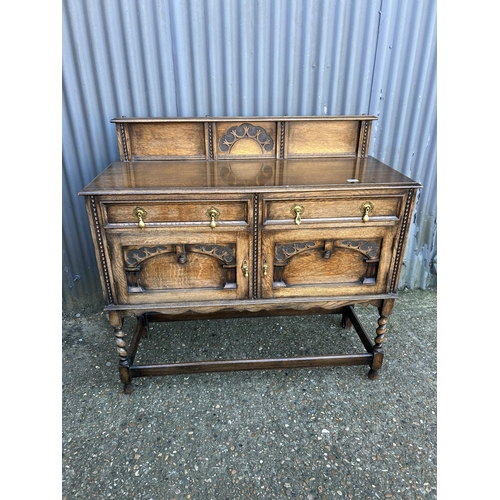 57 - A early 20th century carved oak sideboard 120x50x80