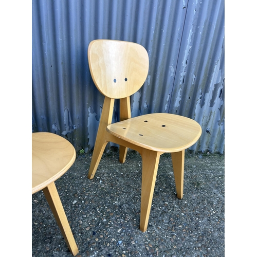 64 - A pair of modern ply butterfly back chairs