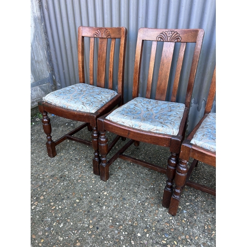 65 - A set of four 1920's oak dining chairs with drop in seats