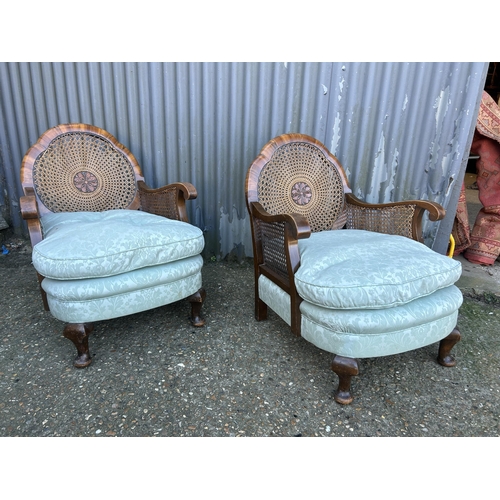 68 - A pair of Edwardian begere salon chairs with blue cushion seats