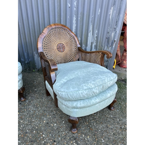 68 - A pair of Edwardian begere salon chairs with blue cushion seats