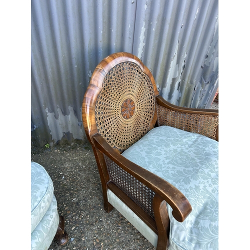 68 - A pair of Edwardian begere salon chairs with blue cushion seats