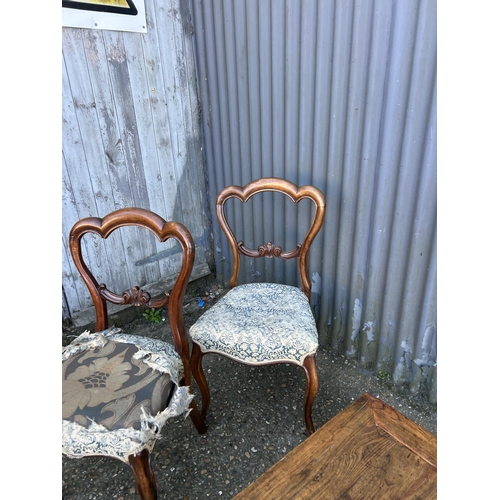 69 - A rustic style coffee table and a pair of Victorian balloon back chairs