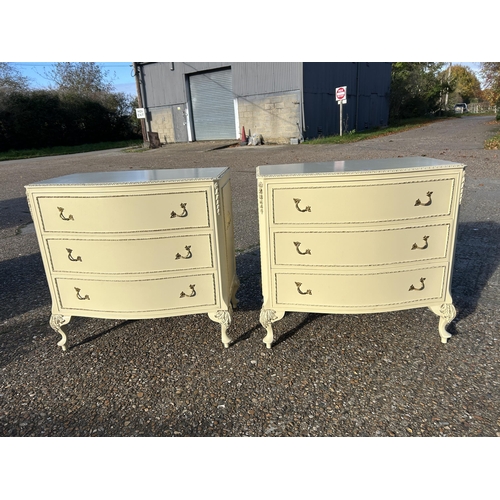 76 - A pair of white and gold painted French style chests of three drawers 77x48 x75