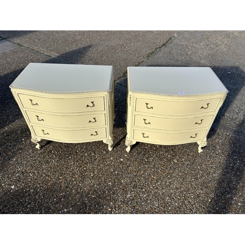 76 - A pair of white and gold painted French style chests of three drawers 77x48 x75