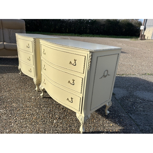 76 - A pair of white and gold painted French style chests of three drawers 77x48 x75