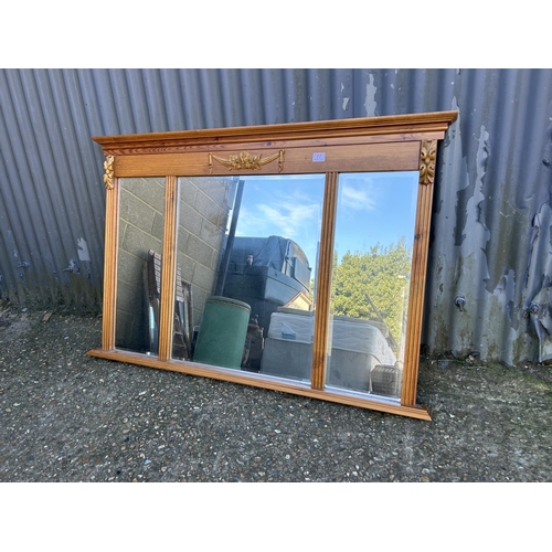 77 - A large pine overmantel mirror 126x85