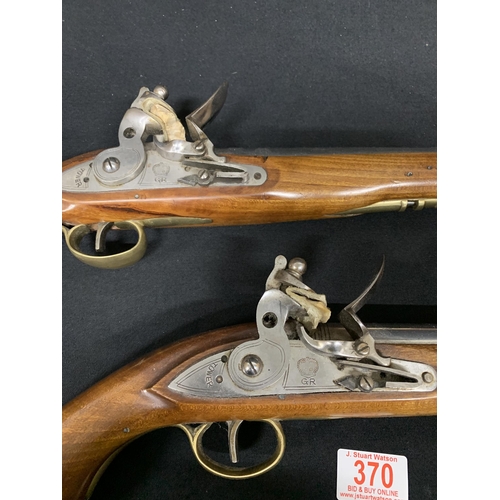 370 - A good quality pair of vintage reproduction Flintlock Pistols each length 40 cms