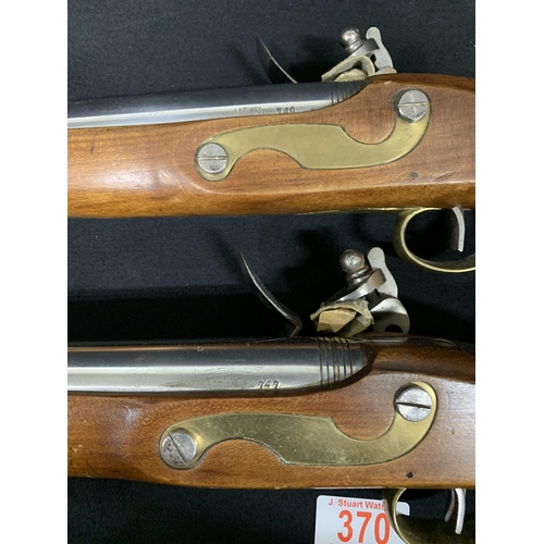 370 - A good quality pair of vintage reproduction Flintlock Pistols each length 40 cms