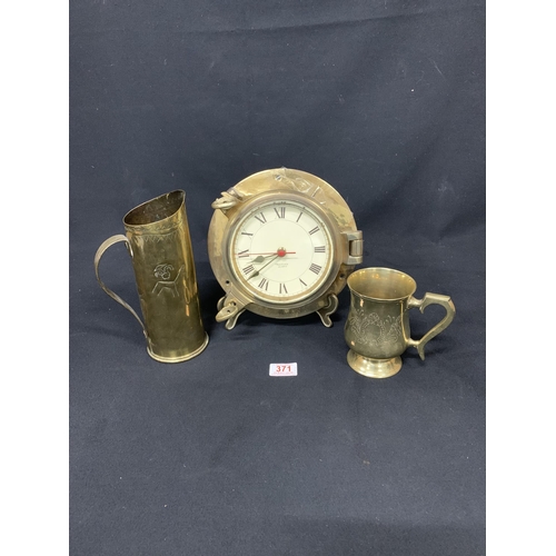 371 - Brass Quartz Ships Clock, dial diameter 15 cms, Trench Art Jug dated 1905 and brass tankard