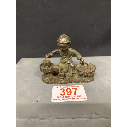 397 - Japanese Bronze figure of a boy cooking, length 7.5 cms, height 6 cms