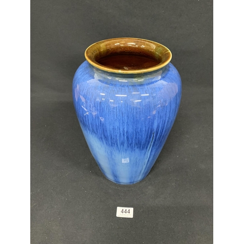 444 - Tall blue glazed pottery vase, height 34cms