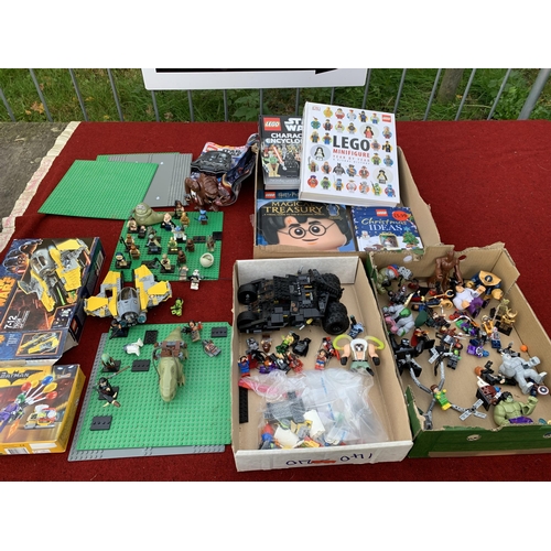 487 - 4 trays: LEGO items and books and other makes of small figures