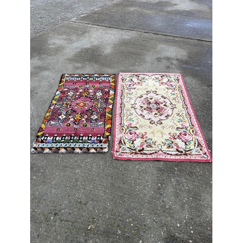 576 - 2 hand made woollen rugs, largest 148 x 92cms