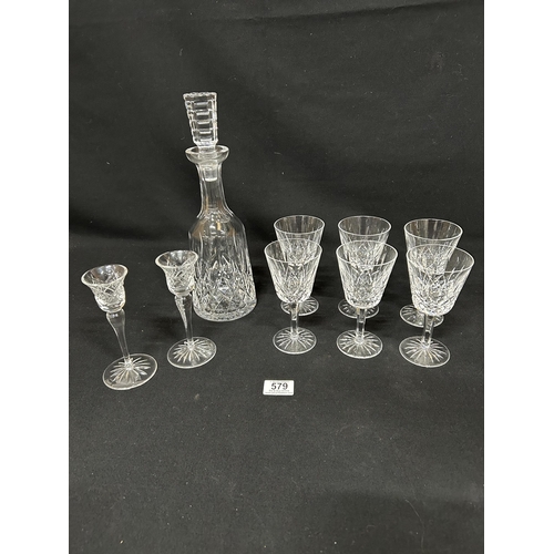 579 - Waterford crystal: decanter, 6 glasses and pair candle holders, glasses height 15cms, no damage