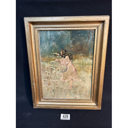 629 - Framed oil on canvas, girl in flower meadow, signed lower right, 30 x 38cms