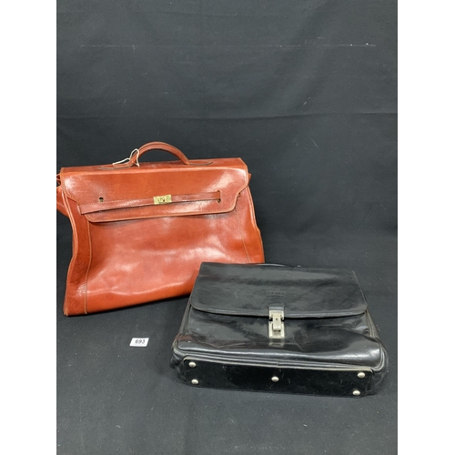 693 - Two leather cases