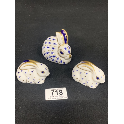 718 - Two Royal Crown Derby Rabbit Paperweights and one other unmarked Rabbit