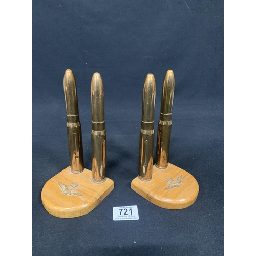 721 - Pair of Bullet style bookends, height 20 cms