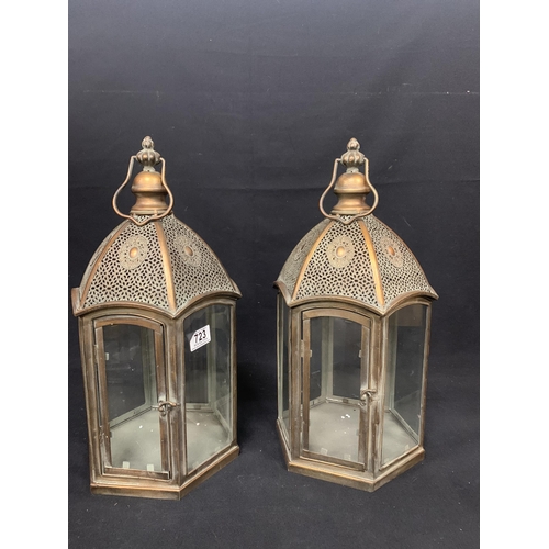 723 - Pair of Antique effect lanterns, height 50 cms