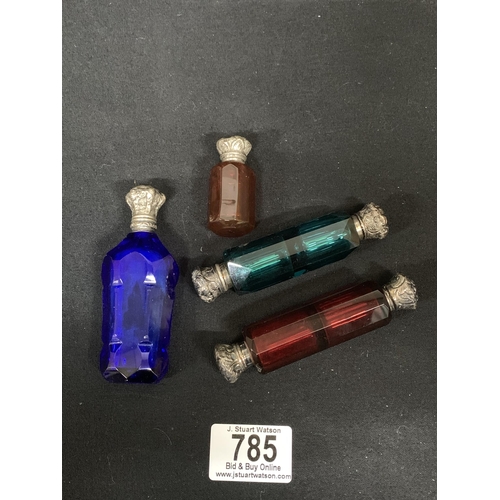 785 - 4 Victorian Silver Topped Coloured Glass Scent Bottles