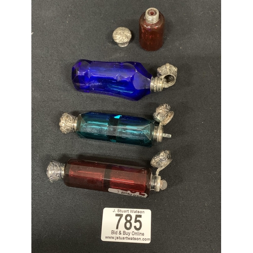 785 - 4 Victorian Silver Topped Coloured Glass Scent Bottles