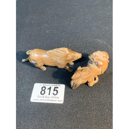 815 - Two signed oriental carved wooden animal Netsuke