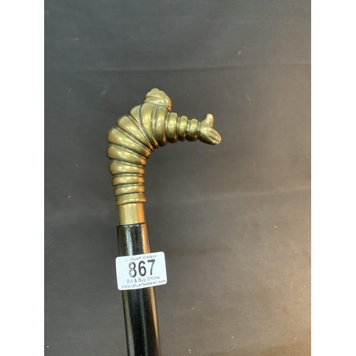 867 - Novelty Diving Mr Michelin handled walking stick, labelled Michelin around collar