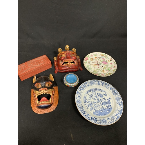 875 - Two carved wooden face masks, cinnabar box a/f, two plates and cloisonné bowl