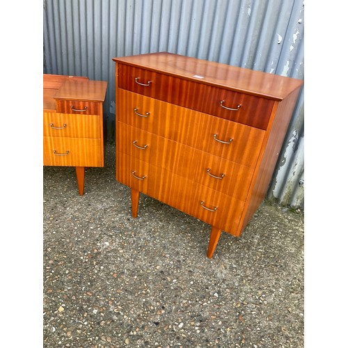 145 - A mid century teak bedroom pair consisting of chest of drawers and matching desk