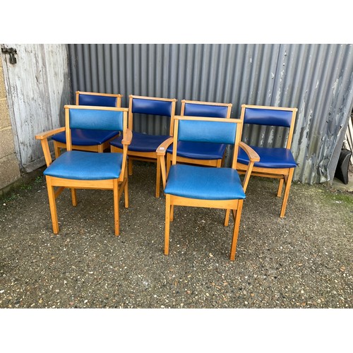 148 - A set of six blue vinyl seated interlocking  church chairs