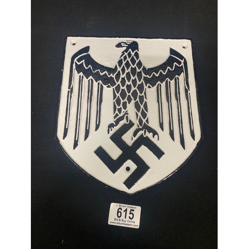 615 - Cast iron swastika plaque