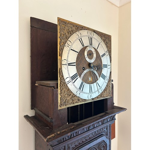 170 - An oak carved long case clock with brass dial by HENRY FISHER OF PRESTON