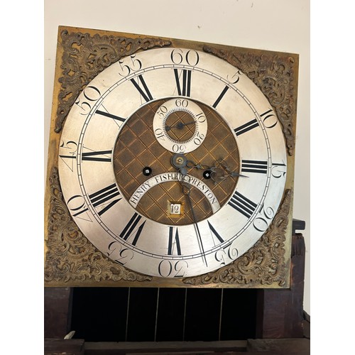 170 - An oak carved long case clock with brass dial by HENRY FISHER OF PRESTON