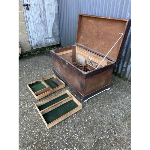 100 - A large vintage pine tool chest with saws and block planes