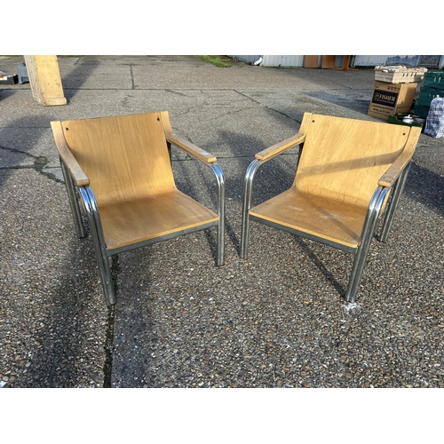 116 - A pair of chrome framed armchairs with bent ply seats