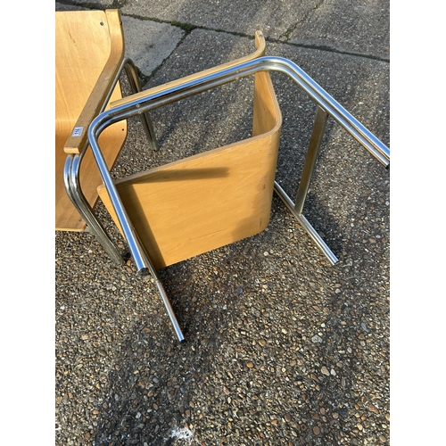 116 - A pair of chrome framed armchairs with bent ply seats