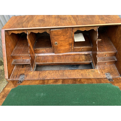 120 - A Georgian walnut bureau with fitted interior