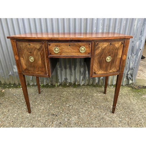 121 - A small mahogany bow front sideboard  106x55x87