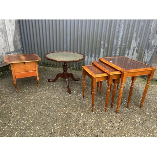 123 - A yew nest of three together with reproduction coffee table and a  sewing box