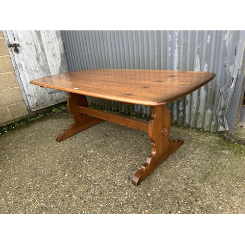 136 - An ercol golden dawn refectory dining table 180x87x77