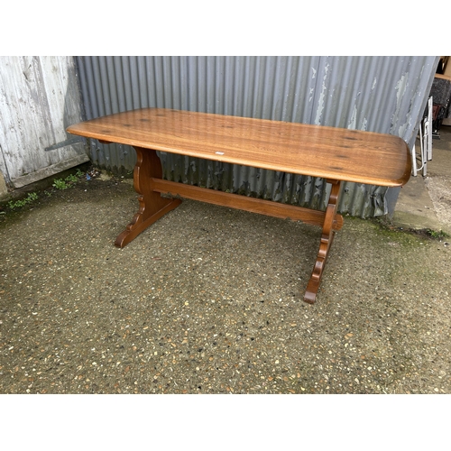 136 - An ercol golden dawn refectory dining table 180x87x77