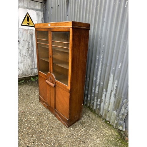 141 - A early 20th century glazed oak cabinet 92x30x120