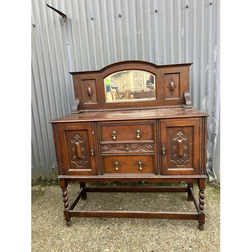 143 - A 20th centuey oak mirror back sideboard