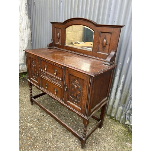 143 - A 20th centuey oak mirror back sideboard