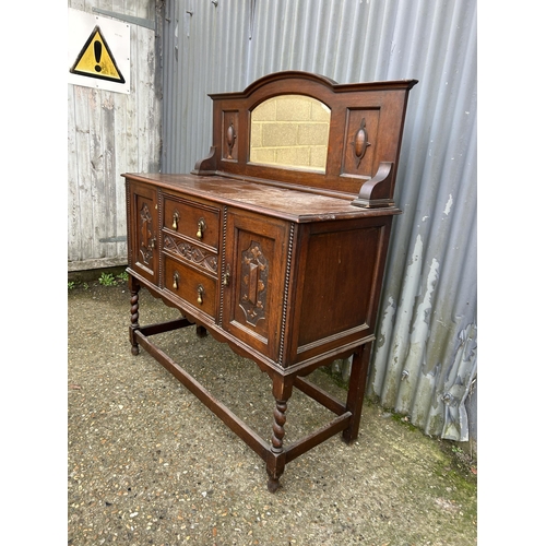 143 - A 20th centuey oak mirror back sideboard