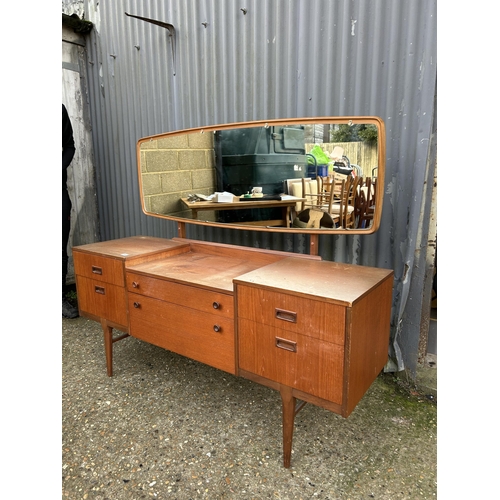 144 - A mid century Nathan teak dressing table