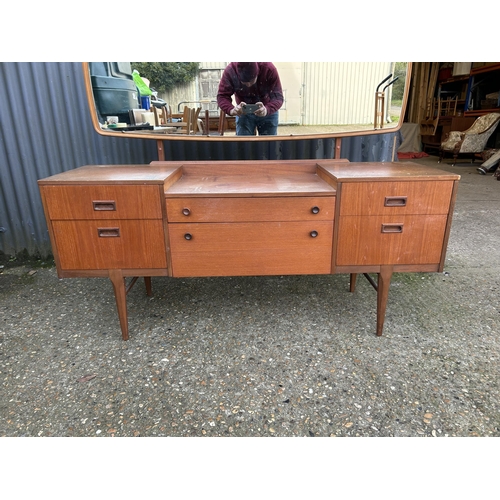 144 - A mid century Nathan teak dressing table