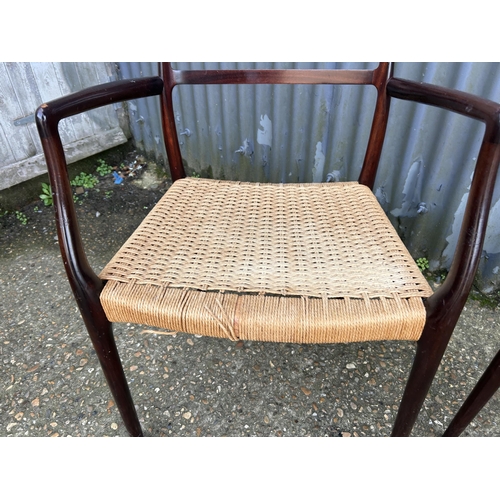 153 - A pair of danish or similar carver chairs with rush seats